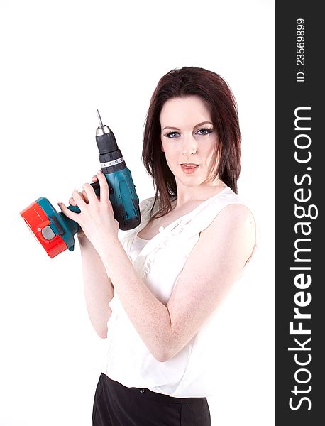 Young brunette posing with drill. Young brunette posing with drill