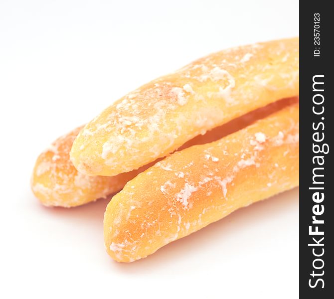 Breads with white sugar on top on white background. Breads with white sugar on top on white background