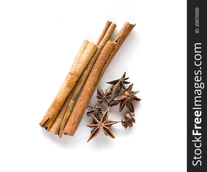 Cinnamon  and anise  on white background