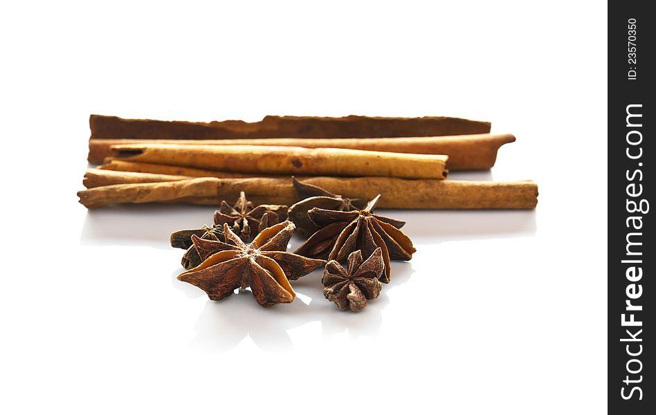 Cinnamon  and anise  on white background