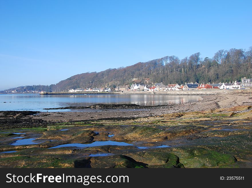 The view along the tranquil coastline at Limekilns in Fife. The view along the tranquil coastline at Limekilns in Fife