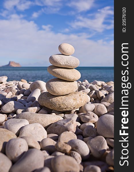 Balanced pebbles on a beach. Harmony, Teamwork or Meditation. Balanced pebbles on a beach. Harmony, Teamwork or Meditation.