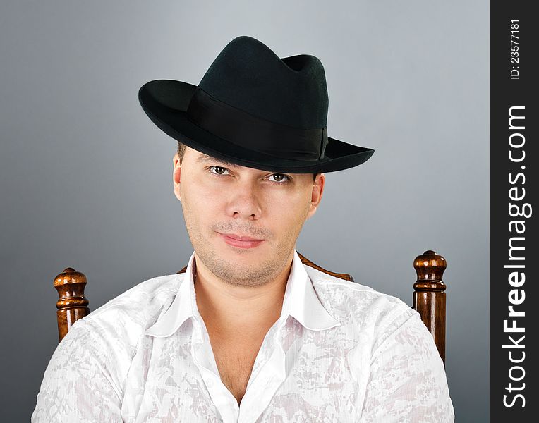 Portrait of young man in a hat