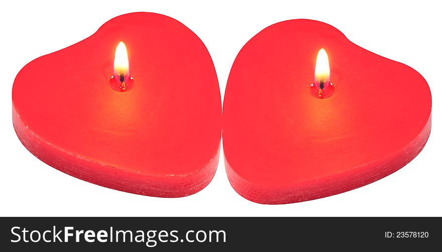 Lit red candles over white background. Lit red candles over white background.