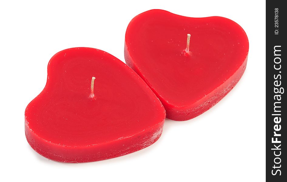 Heart shape candles against white background. Heart shape candles against white background.