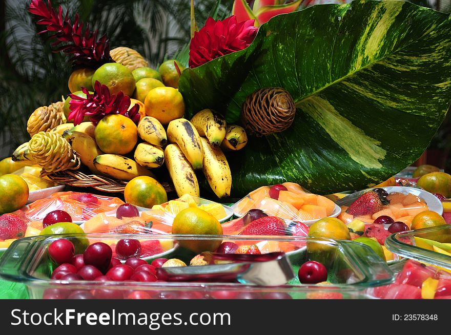 Variety of fresh fruits on a food display. Variety of fresh fruits on a food display.