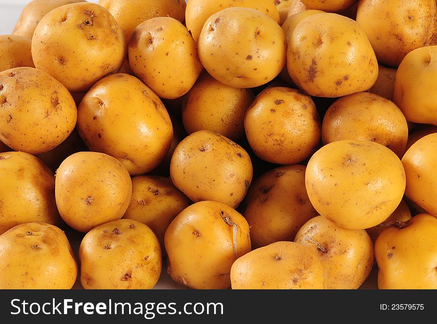 Fresh yellow potatoes for backgrounds. Fresh yellow potatoes for backgrounds.