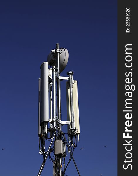 Mobile communication antenna, blue sky background