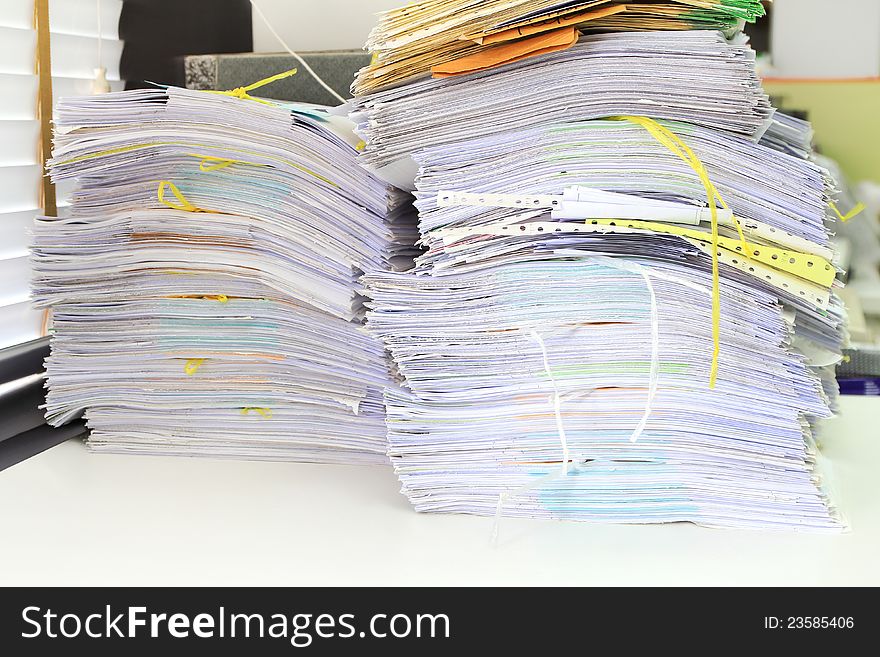 Stack pile of document papers on table. Stack pile of document papers on table