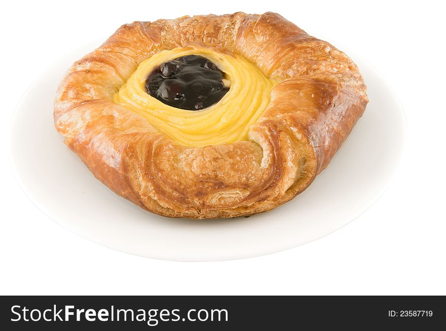 Picture of a Blue berry danish pie on a plate