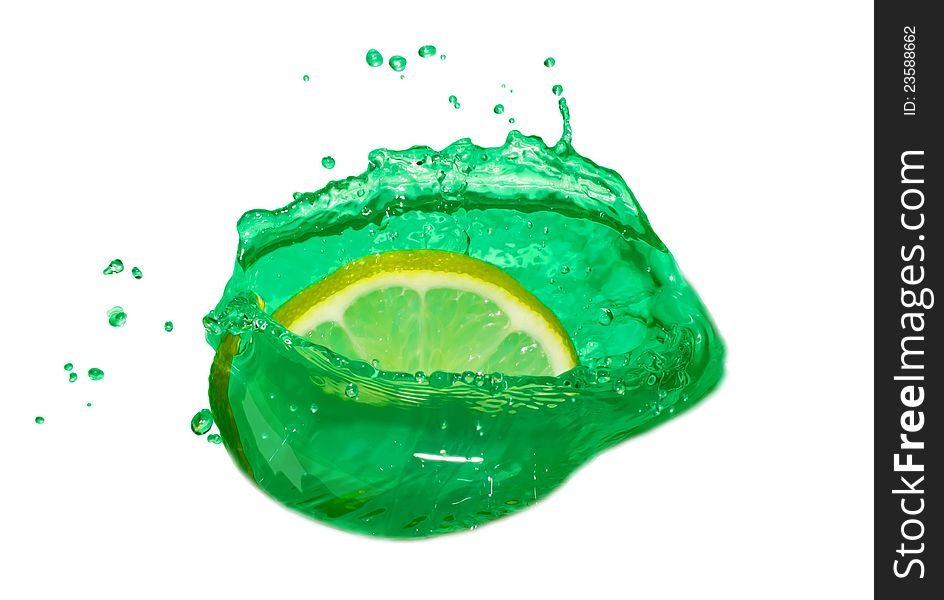 Slice of lime, surrounded by green liquid on a white background on a white background