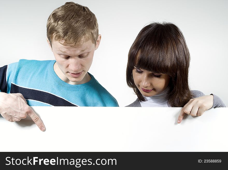 The Man And The Woman Points To The Background