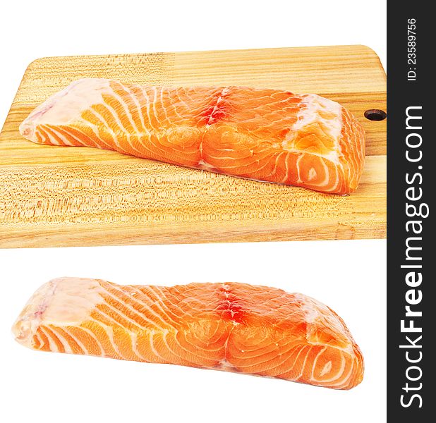Fresh raw salmon fish piece over wooden board isolated on white background