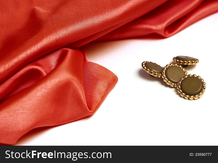 Buttons and cloth isolated on white background