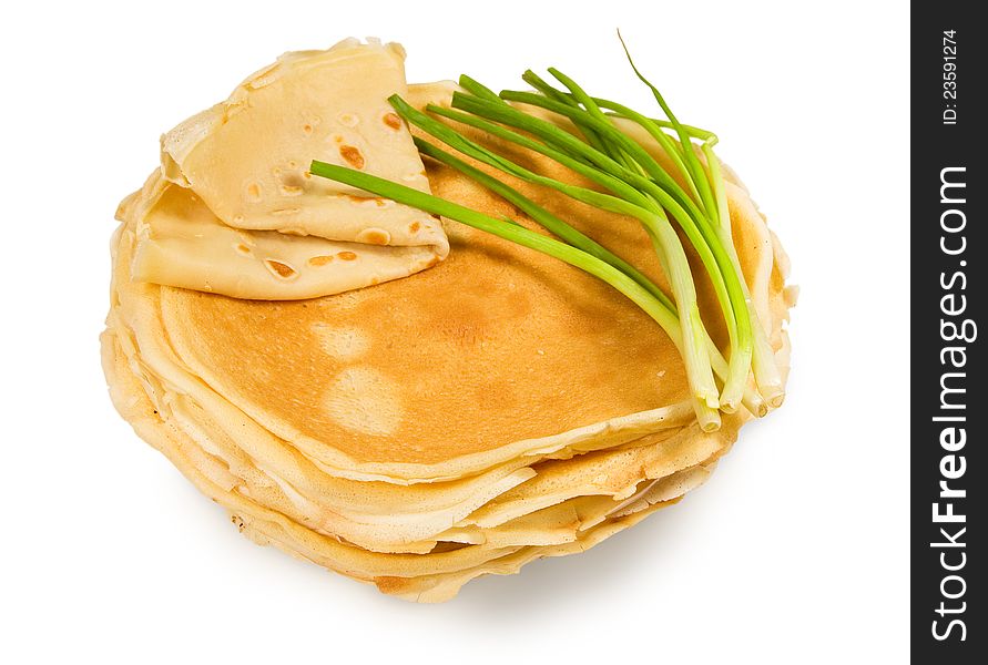 Homemade pancakes with green onions on a white background