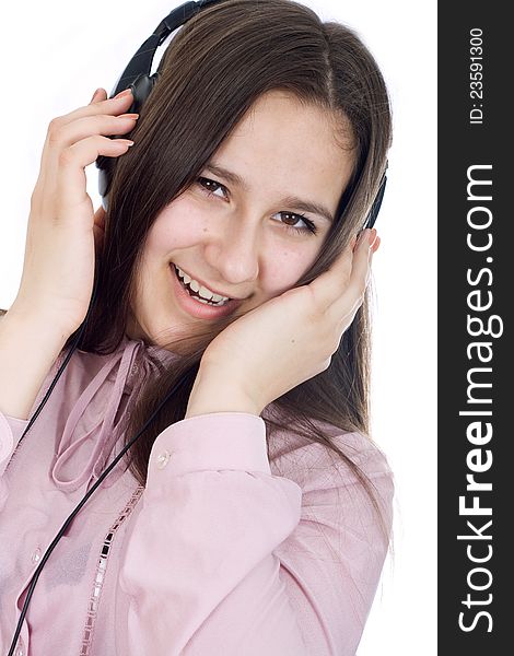 Woman with eyes closed listening to music on headphones. Woman with eyes closed listening to music on headphones.