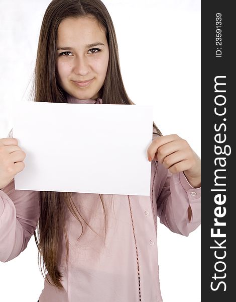 Teenager holding a piece of paper.