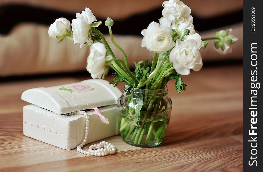Bouquet of white colors and casket