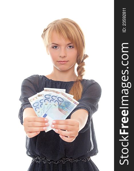 Young woman holding money in his outstretched hands isolated on white background. Young woman holding money in his outstretched hands isolated on white background
