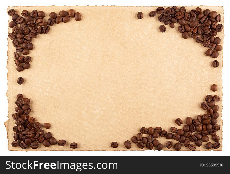A frame made from coffee crops on hand-made paper and isolated on white. Place for text.