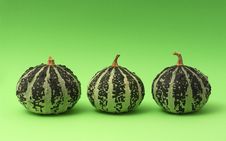 Three Pumpkins On Green Backgr Royalty Free Stock Image Three Pumpkins On Green Backgr Royalty Free Stock Image