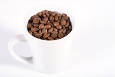White Mug With Coffeebeans Royalty Free Stock Image
