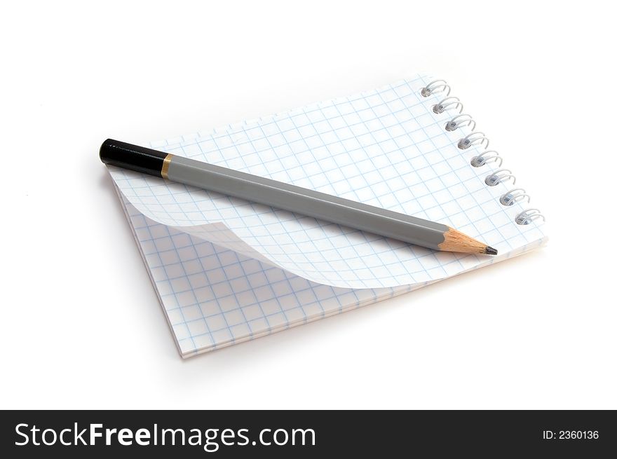 Pencil and notebook on white. Isolated. Pencil and notebook on white. Isolated