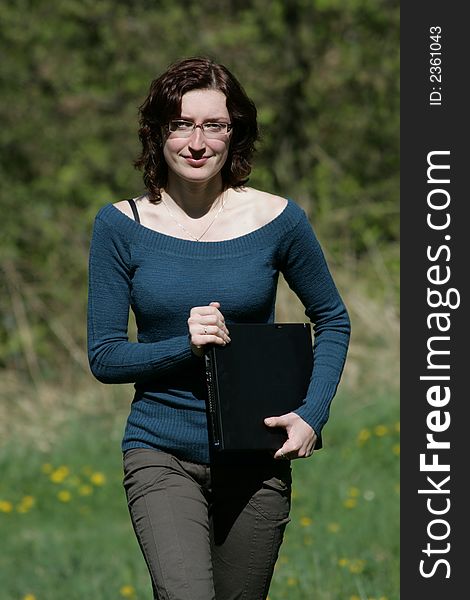 Young woman and notebook