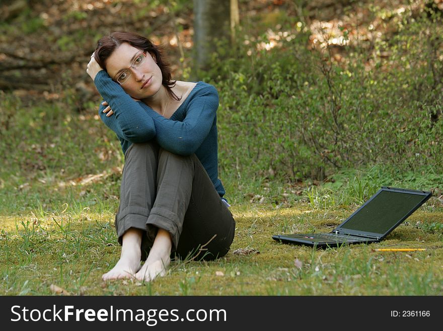 Young woman and notebook