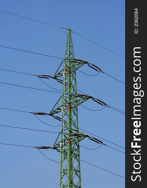 High Voltage Power lines against a blue sky. High Voltage Power lines against a blue sky