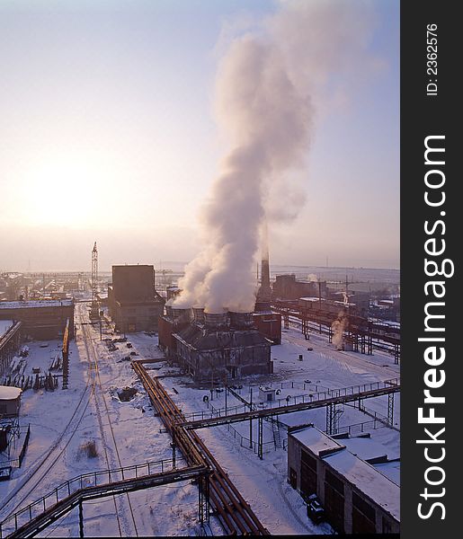 Early morning on metallurgical plant. Blast furnace at sunrise. Early morning on metallurgical plant. Blast furnace at sunrise