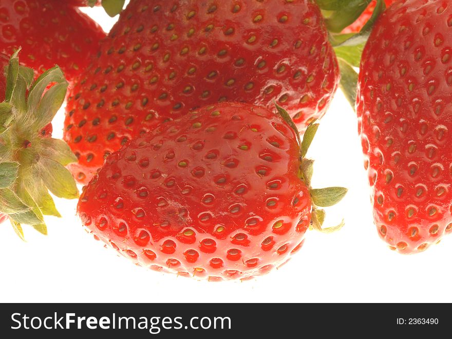 Red strawberries on light box. Red strawberries on light box