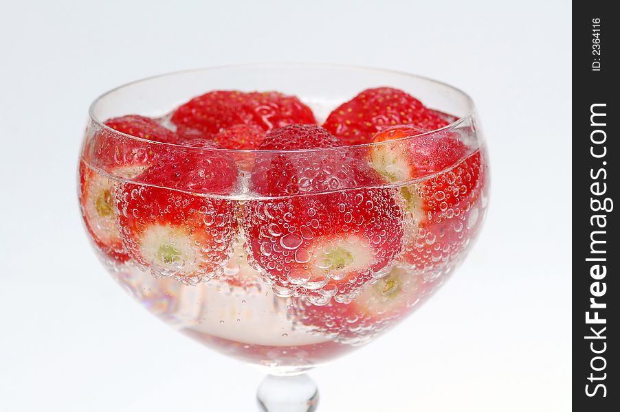 Red strawberries in the glass