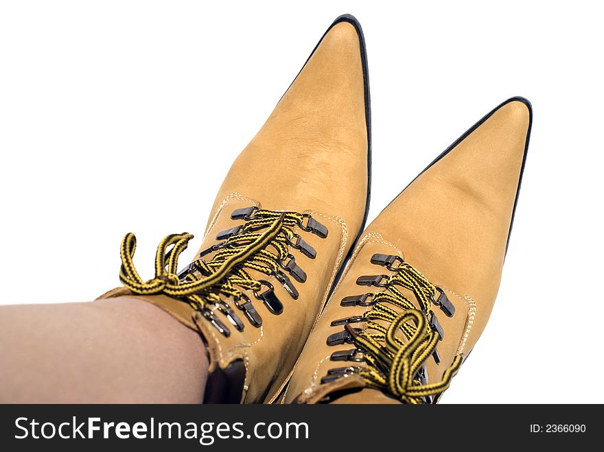 A fashionable pair of women's boots inspired by the classic North American work boot. Shot on white with a shallow depth of field. A fashionable pair of women's boots inspired by the classic North American work boot. Shot on white with a shallow depth of field.