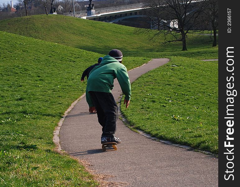 Skating down the hill with speed. Skating down the hill with speed