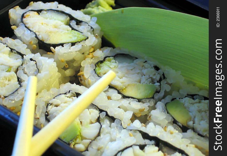 This is an image of a california roll. This is an image of a california roll.