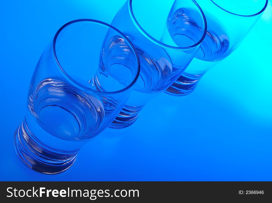 Liquid filled glasses with blue backlighting. Liquid filled glasses with blue backlighting.