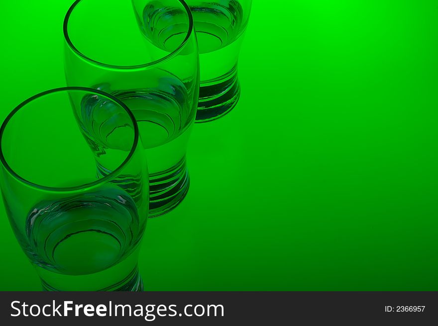 Liquid filled glasses with green back lighting. Liquid filled glasses with green back lighting.