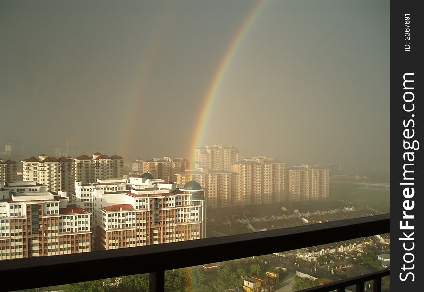 Rainbow caught in the middle of the city. Rainbow caught in the middle of the city