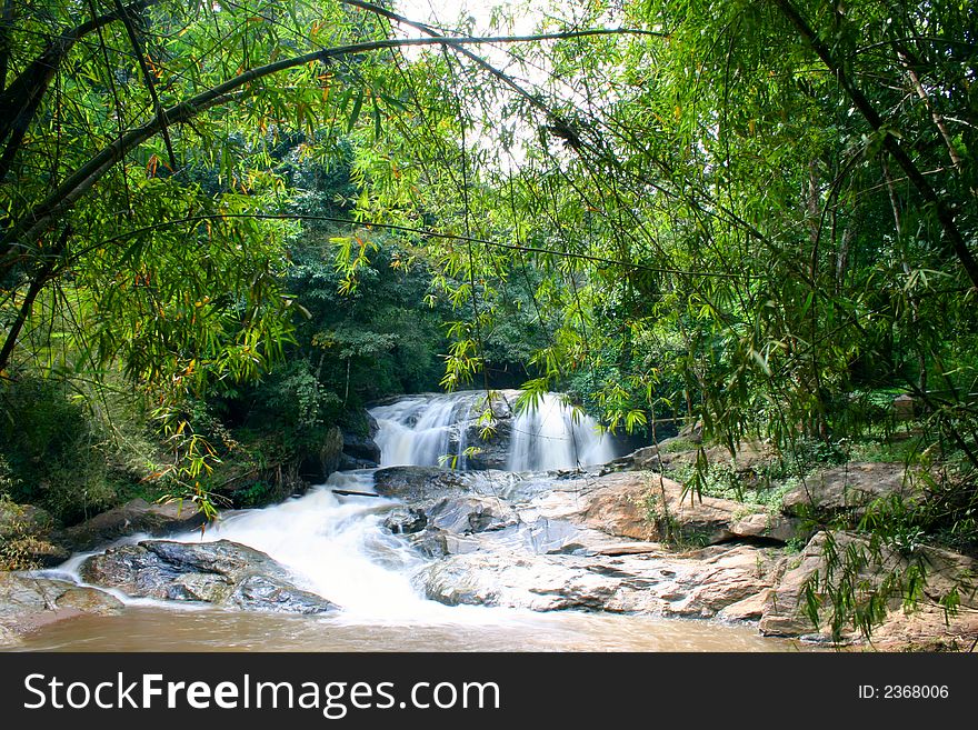 Waterfall with crystal clear water found in a forest. Waterfall with crystal clear water found in a forest