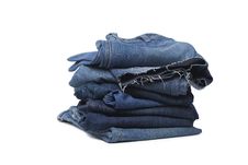 Stack Of Blue Jeans Isolated On White Royalty Free Stock Image
