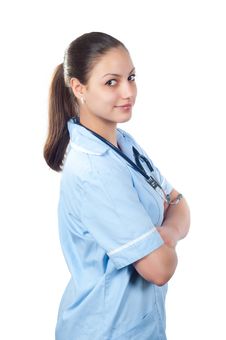Portrait Of Smiling Woman Doctor From Profile Royalty Free Stock Photo