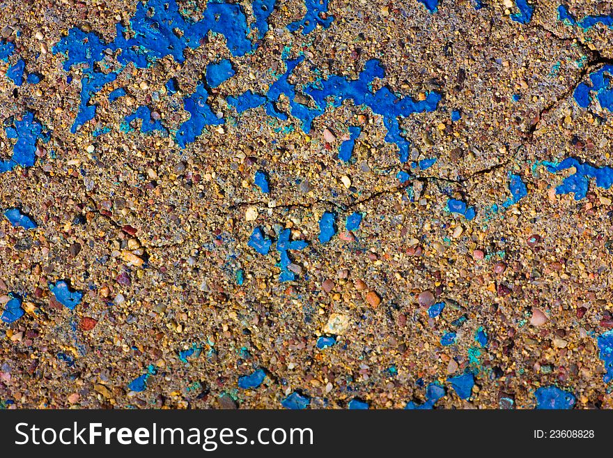 Gritty pebbly cement abstract with blue. Gritty pebbly cement abstract with blue