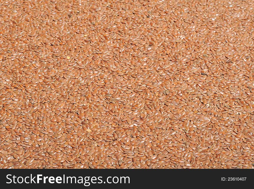 Brown flax seeds as a background