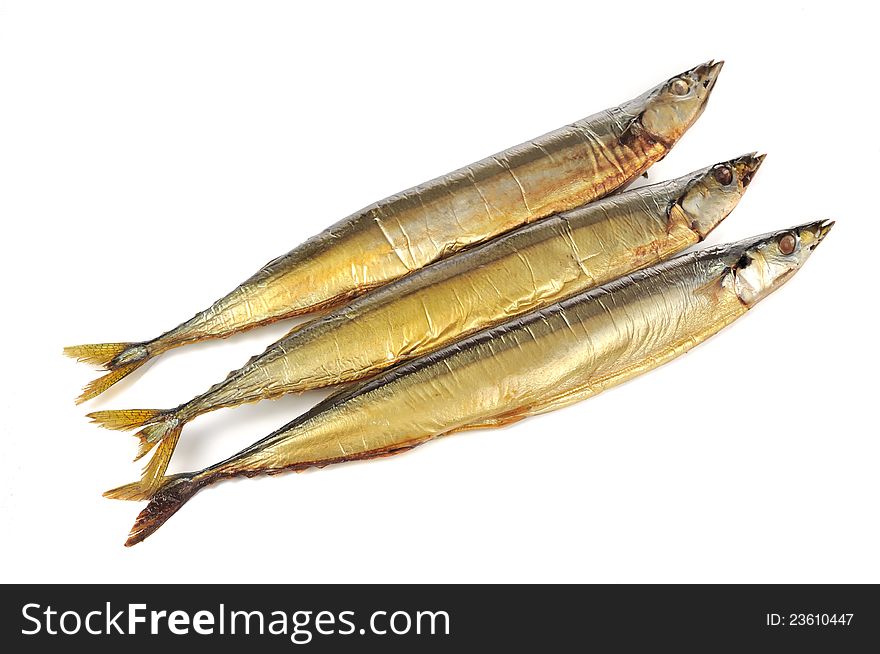 Three smoked saury fish on a white background