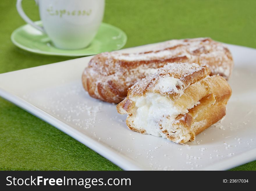 Custard pastries and a cup of coffee