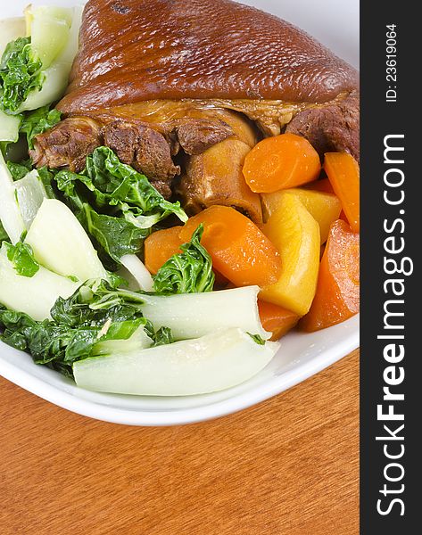 Stewed Ham Hock Served With Vegetables