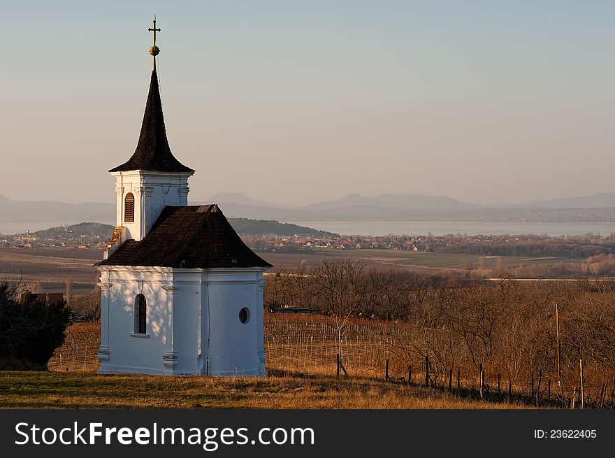 Small chapell at a wineyard with the lake of Balaton on background. Small chapell at a wineyard with the lake of Balaton on background