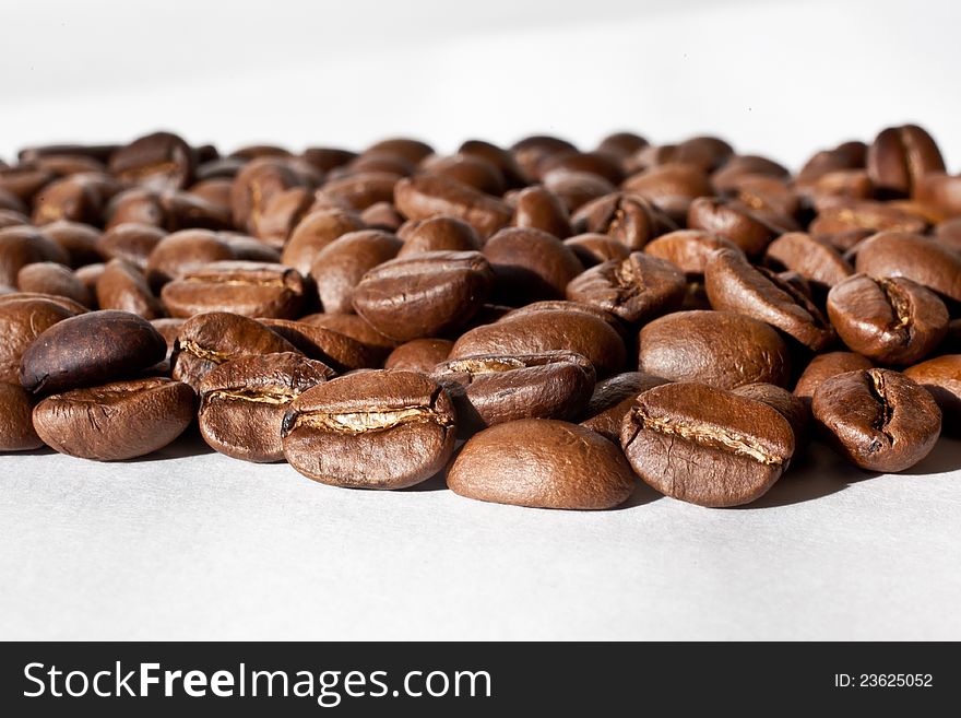 Lying coffee beans close-up