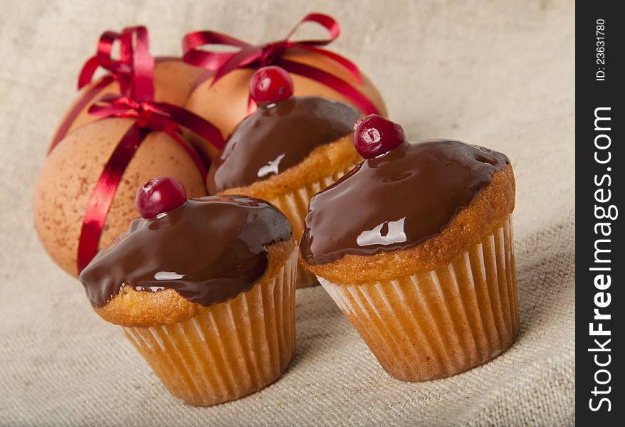 Cupcakes with chocolate icing and Easter Eggs. Cupcakes with chocolate icing and Easter Eggs